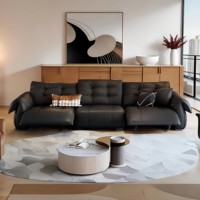 Grand canapé d'angle en cuir italien haut de gamme, moderne et luxueux, pour la maison.