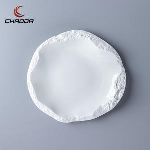 Assiettes chargeur en céramique de 6.7 pouces avec texture de surface de roche plats blancs en porcelaine fine pour assiettes décoratives en céramique de <span class=keywords><strong>restaurant</strong></span> - Product Image 1