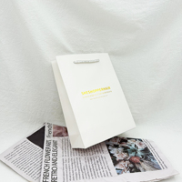 Sacs en papier cadeau de mode de luxe personnalisé avec emballage de bijoux de logo d'impression d'estampage sur feuille sac en papier à provisions portable