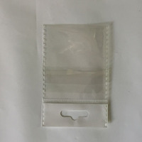 Sacs en plastique polypropylène transparents personnalisés avec impression en héliogravure BOPP, bande blanche, trou de suspension et fermeture auto-adhésive