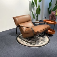 Fauteuil à bascule style Cass, fauteuil lounge rembourré en cuir avec structure métallique pour salon, chambre, bureau, détente