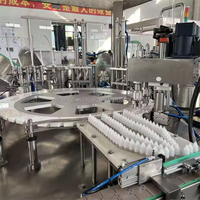 Machine de remplissage de bouteilles en verre efficace à grande vitesse 30ml 60ml 100ml Machine de remplissage d'huile essentielle Machine de remplissage pour parfum