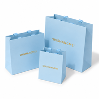 Sacs en papier personnalisés pour cosmétiques et vêtements, sacs de shopping en papier personnalisés de luxe bleus