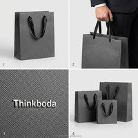 Sacs à bijoux en papier kraft imprimés numériquement faits à la main de luxe avec poignées en ruban pour bagues et colliers