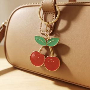Adorable porte-clés cerise en émail rouge Kawaii en promotion pour sacs à dos et sacs d'école pour filles, ornement décoratif - Product Image 2