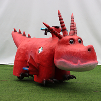 Trottinette électrique dinosaure personnalisée pour enfants, modèle avec siège sécurisé, idéale pour la location en aire de jeux intérieure/extérieure