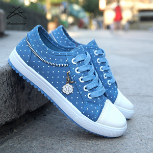 Nuevas zapatillas deportivas casuales para <span class=keywords><strong>mujer</strong></span>, de lona azul con lunares, transpirables, con cordones y suela de PVC. - Product Image 1