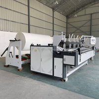 Machine de rembobinage, de découpe et de perforation de papier toilette contrôlée par PLC avec moteur à engrenages et roulement