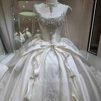 Gaun Pengantin Model Ball Gown Jancember DW0231 Bergaya Elegan Warna Ivory Satin dengan Tali Spaghetti, Hiasan Manik-Manik, dan Pita