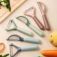 Pengupas Buah & Sayur Multifungsi Stainless Steel Rumah Tangga dengan Pisau Pemotong dan Pengiris untuk Melon dan Kentang