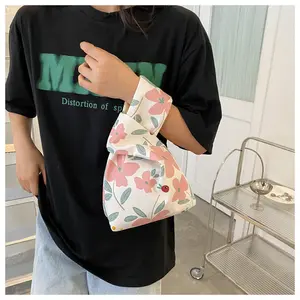 2022 Eco-friendly Japanese Korean Style Simple Candy Gift Bag Carry Key Knot Wrist Bag Women
