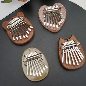 Kalimba Mini en Bambou avec Cordon Offert - Idéal pour Débutants - Ensemble Éducatif de 6 Pièces - Bestseller Transfrontalier en Forme de Goutte d'Eau - Product Image 1