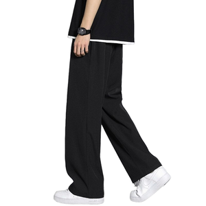 Pantalones casuales de hombre ligeros y transpirables de cintura media, estilo vintage, de tela de estambre con lavado oscuro, cintura elástica, bolsillos modernos con cremallera. - Product Image 1