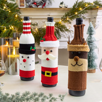 Nouvelle conception 2025, fournitures de décoration de Noël, housse de bouteille de vin rouge tricotée pour la table à manger, manchon de vin de Noël festif