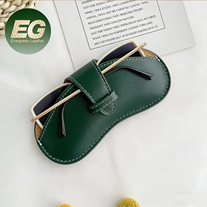 Étuis à lunettes de luxe personnalisés en cuir PU, vente en gros, boîte de rangement haut de gamme pour lunettes de soleil avec logo de marque et breloque personnalisée - Product Image 1