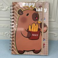 Carnet à spirales mignon Kapibala avec des pages colorées, motif ours café et capybara, planificateur de grande valeur avec ruban.