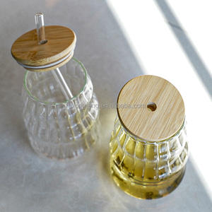 Taza de vidrio de borosilicato de diseño vertical de alta calidad con pajita y tapa de Bambú - Product Image 5