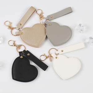 Custom Logo Small Pu Leather Mirror Keychain Travel Rotatable Heart Makeup Cosmetic Pocket Vanity Mini Hand Mirror Keychain - Product Image 4