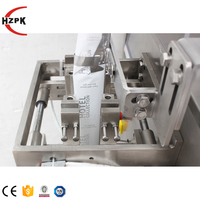 Machine d'emballage automatique de sachets de miel de ketchup de pâte de tomate à quatre côtés HZPK
