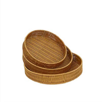 Panier de rangement rond tissé en rotin Plateau de nourriture domestique Panier en rotin multi-modèle personnalisé