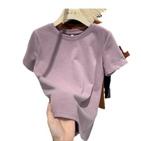 Venta al por mayor de fábrica de camisetas de cuello redondo para mujer, de alta calidad, estilo veraniego, a la moda, holgadas, cómodas y de color liso.