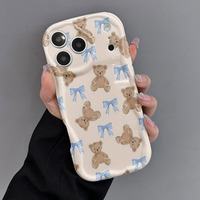 Coque de téléphone motif ours mignon et nœud crème pour iPhone 16 15 14 13 12 17 Pro 18 Pro Max, coque antichoc à bords ondulés, étui arrière