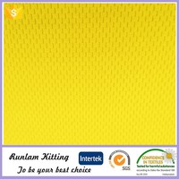 Tissu en tricot texturé tissu à oeillets mèche 100% polyester maille tissu Sublimation Dryfit pour T-shirt en jersey de sport