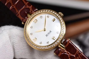 Reloj de cuarzo estilo Deville para mujer, tono dorado, bisel con diamantes, esfera blanca, números romanos, correa de cuero marrón, elegante reloj de pulsera Omegaes - Product Image 2