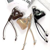 Nouvelle mode : Décoration suspendue pour petit sac, faite main, en cuir et coton, avec corde tressée exquise en PU, porte-clés portable