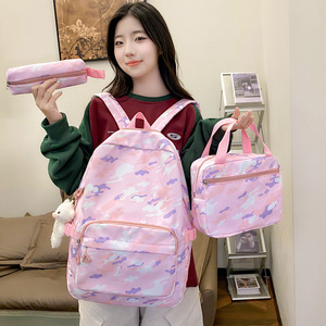 Nuevas mochilas transfronterizas de tres piezas para niños y niñas, mochilas escolares duraderas y de moda de gran capacidad para primaria y secundaria - Product Image 1