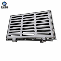 Grille de drainage en fonte ductile à charnières EN124 avec cadre, fabricant de couvercles de drainage routier robustes