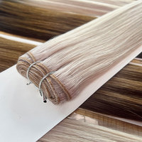 Machine de trame d'extension de cheveux Remy russe sans couture à double dessin en gros de luxe