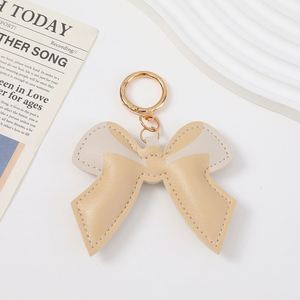 YY PU Leather Bow Keychain Small Backpack Key Ring Pendant Cute Bow Purse <b>Charms</b> with Lobster Clasp for Giifts - Product Image 4