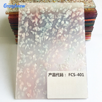 Feuilles fantaisie en acrylique-celluloid de couleur bleue avec paillettes, comme matériau de décoration
