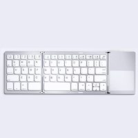 Clavier Bluetooth pliable 3 volets en plastique OEM, 64 touches, portable, fin, sans fil, avec pavé tactile pour Mac et iOS, gris sidéral