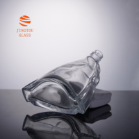 Bouteille en verre de brandy XO de grande capacité de 1000 ml avec un design ondulé, bouteille en verre adaptée à la personnalisation