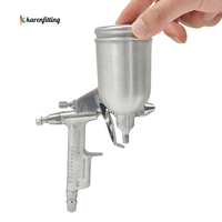 Mini pistolet pulvérisateur de réparation de voiture à haute atomisation original Mini pot supérieur avec alimentation par gravité pour peinture en aérosol