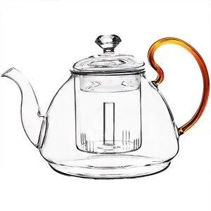 إبريق شاي زجاجي مصنوع يدويًا من البورسليكات ومقاوم للحرارة مع ناقع للشاي يُباع بالجملة