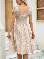 Robe midi d'été pour femme, imprimé floral vintage, décontractée, manches bouffantes, taille plissée, fluide, fabriquée en Chine, idéale pour la plage, les fêtes et le jardin