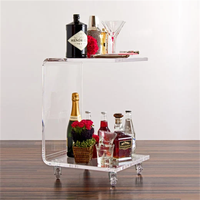 Table basse en acrylique transparente de luxe moderne sur mesure pour salon, avec roulettes, en carton, pour grossistes