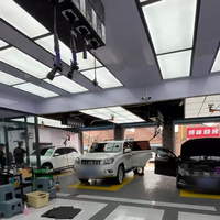 Station de travail complète pour l'esthétique automobile, cabine de lavage de voitures pour garage, espace de travail pour le detailing automobile avec enrouleur de tuyau d'air et grille de drainage au sol