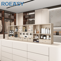 Système de rangement élévateur multifonctionnel pour dressing, avec remontoir de montres automatique intelligent dissimulé sous le comptoir