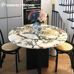 طاولة طعام رخامية دائرية فاخرة من PerfectStone بتصميم عصري راقي من رخام كالاكاتا فيولا قابلة للتخصيص لغرفة المعيشة - Product Image 1