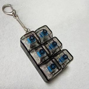 Porte-clés anti-stress en plastique coloré à 6 boutons pour adultes, unisexe, outil de décompression, pour les 36-60 ans - Product Image 4