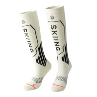 Chaussettes de ski en laine Chaussettes d'hiver pour le camping en plein air, l'alpinisme et la neige Chaussettes longues de sport de compression chaudes et épaissies