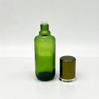 Nouvelle arrivée, flacon cosmétique en verre vert haut de gamme avec bouchon et compte-gouttes électro-plaqué, flacon en verre pour sérum