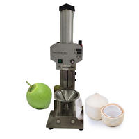 Machine à décortiquer les noix de coco automatique commerciale à succès avec perforateur, haute efficacité, rapide et sûre pour l'élimination de la peau de la noix de coco