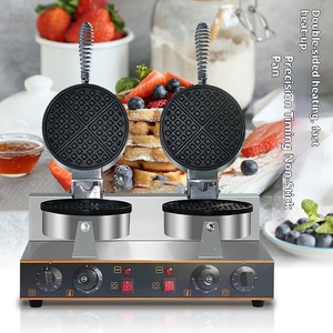 Gaufrier professionnel double tête rotatif en acier inoxydable antiadhésif pour la préparation de gaufres aux œufs, idéal pour les commerces de snacks et les restaurants. - Product Image 2