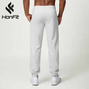 Pantalon de sport décontracté pour homme de haute qualité Pantalon de sport uni en coton et polyester avec logo personnalisé Pantalon de survêtement décontracté pour homme - Product Image 3