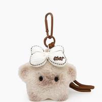 Breloque de sac en peluche esthétique rose pâle avec nœud et étoile, design Kawaii moelleux couleur avoine, style dessin animé Anime, porte-clés et décoration de sac à dos tendance